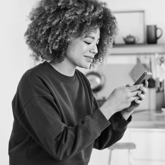Woman working on a mobile device